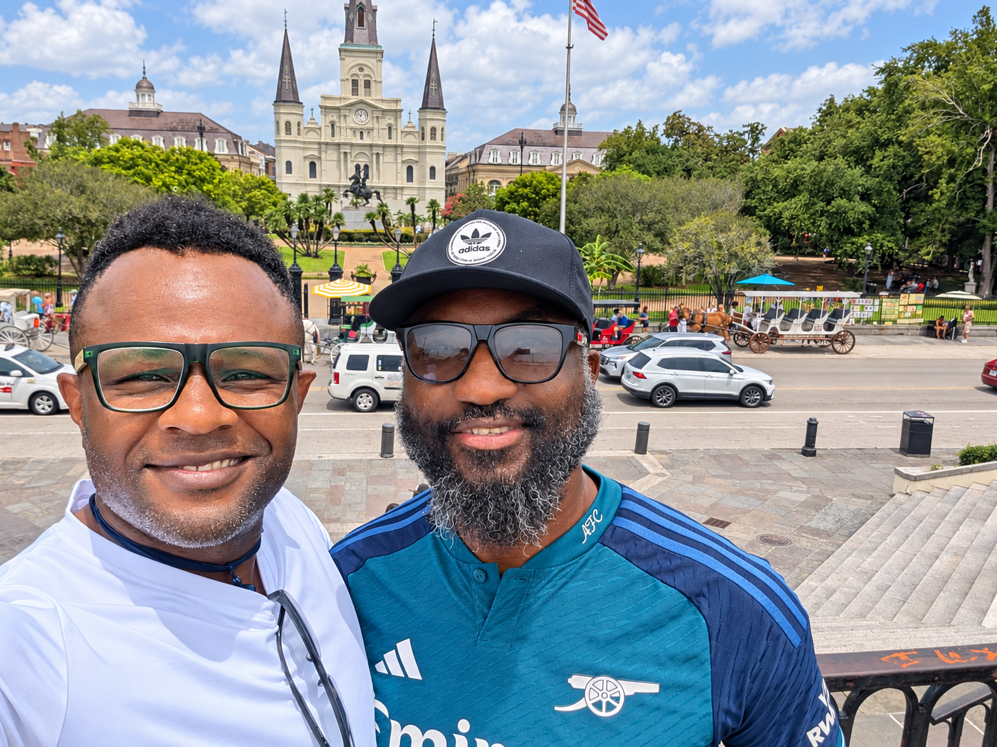 Ọlálékan and Dr Tokunbo Tijani together in New Orleans, with St Louis Cathedral and Jackson Square behind them